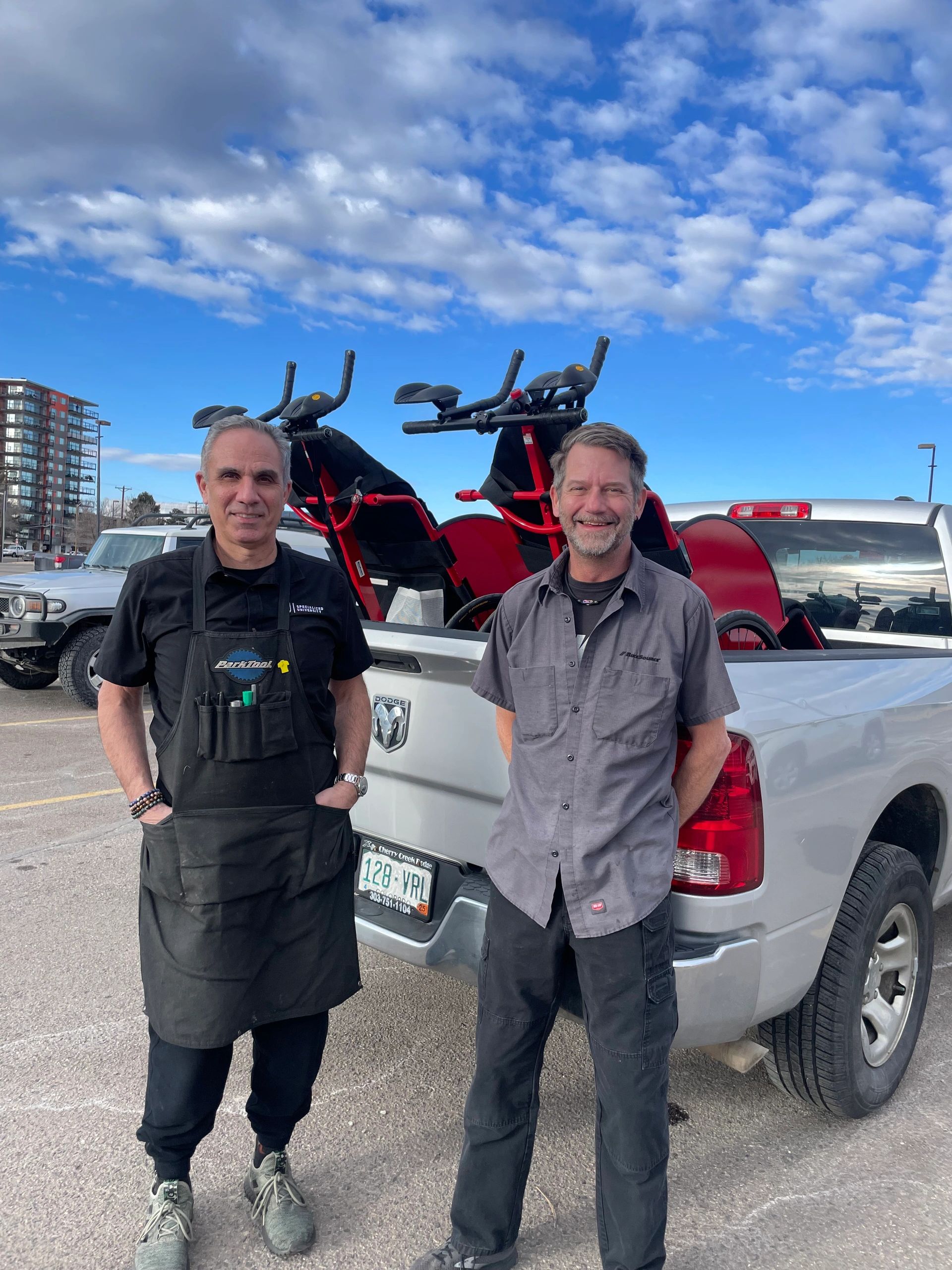 BikeSource team members with Team Hoyt Denver racing chairs