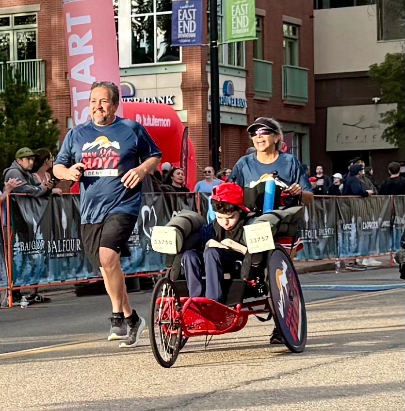 Team Hoyt Denver finish line moment